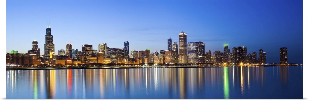 USA, Illinois, Chicago. Dusk view of the skyline from Lake Michigan.