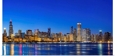 Illinois, Chicago. The City Skyline and a frozen Lake Michigan