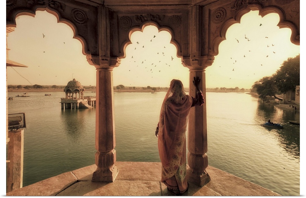 India, Rajasthan, Jaisalmer, Gadi Sagar Lake, Indian Woman wearing traditional Saree outfit