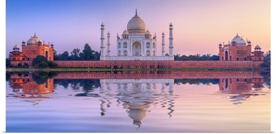 India, The Taj Mahal Mausoleum Reflecting In The Yamuna River At Sunset