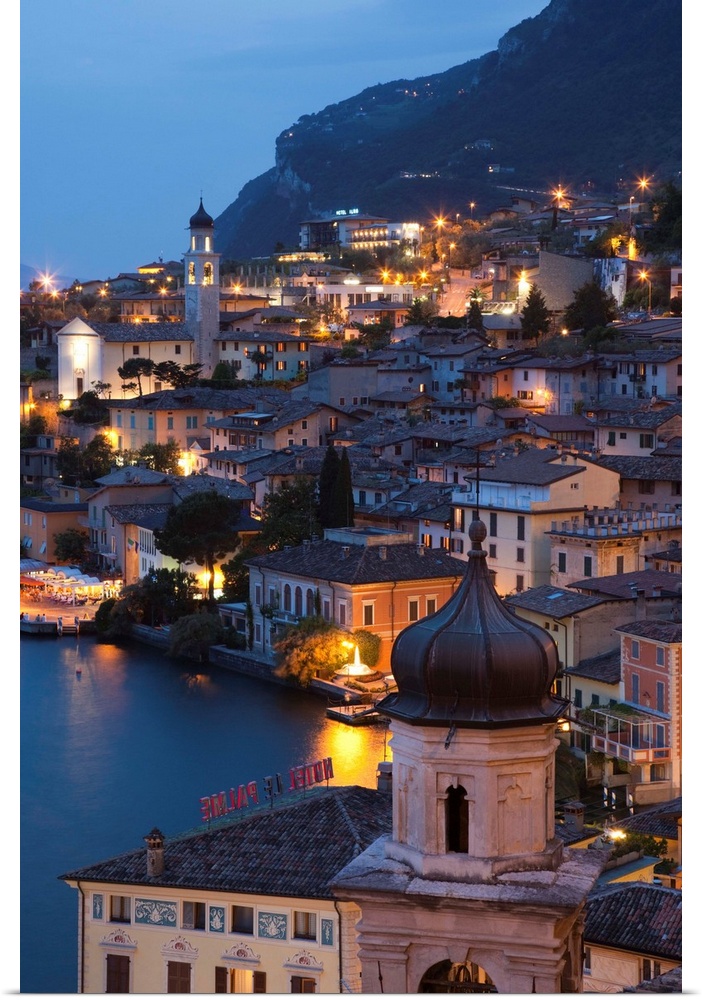 Italy, Lombardy, Lake District, Lake Garda, Limone sul Garda, aerial town view, dusk