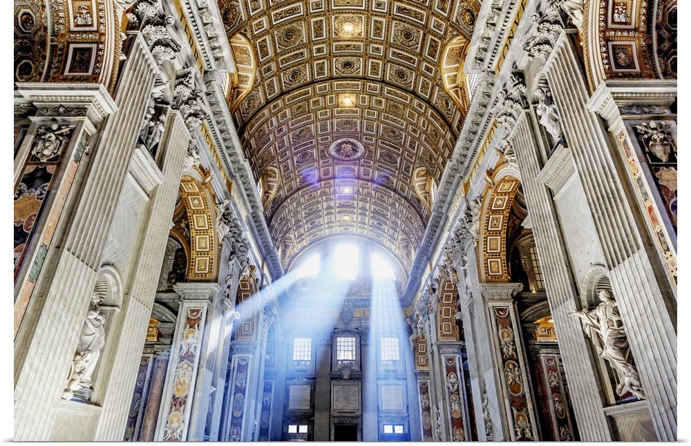 Italy, Rome, St. Peter Basilica interior with sun lights penetrating through the windows at sunrise