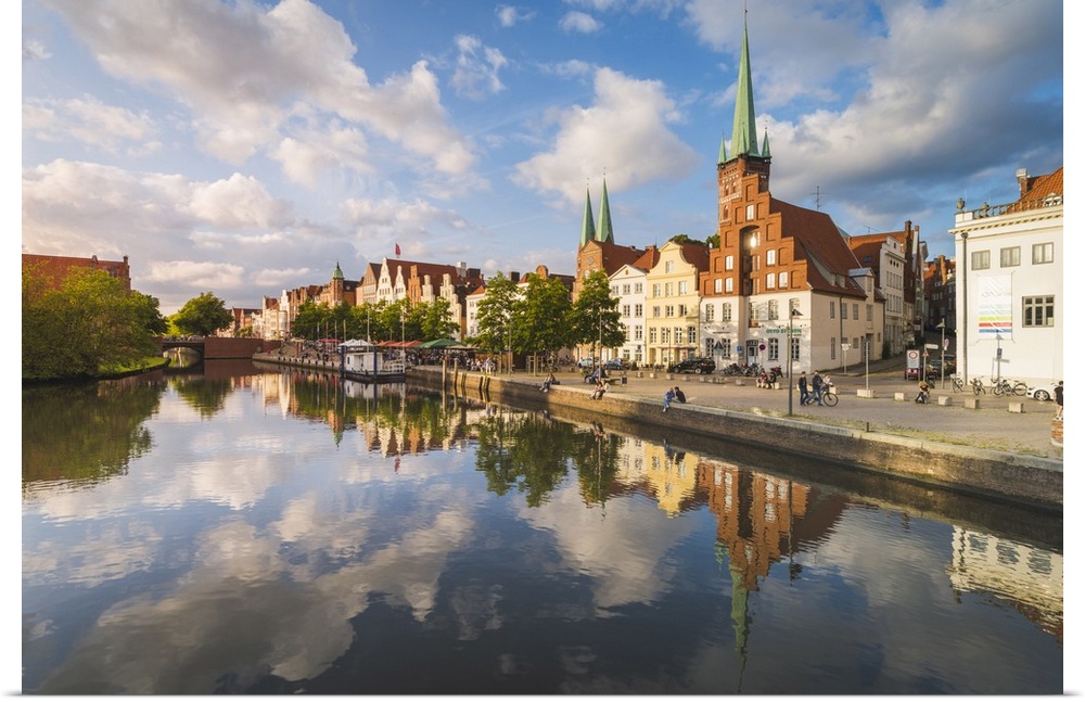 Lubeck, Baltic coast, Schleswig-Holstein, Germany. Old town's houses along the Trave river's waterfront.