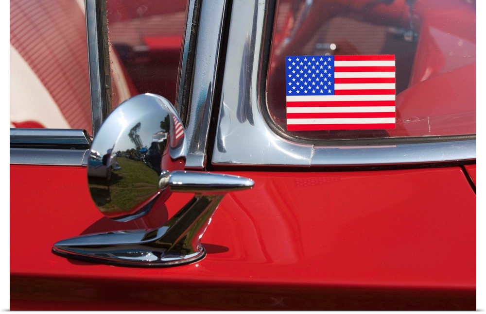 USA, Massachusetts, Cape Ann, Gloucester, antique car show, US flag sticker on windshield of red car