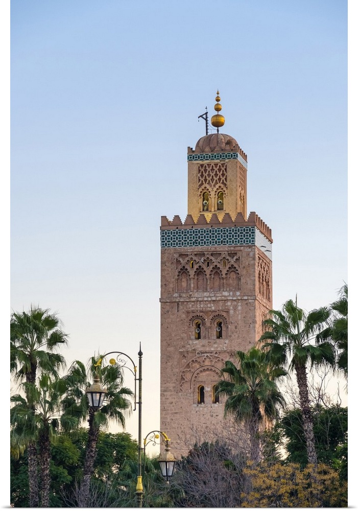 Morocco, Marrakech-Safi (Marrakesh-Tensift-El Haouz) region, Marrakesh. Minaret of 12th century Koutoubia Mosque at dusk.