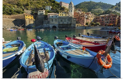 Moored fishing boats in the small port of Vernazza, Cinque Terre, Liguria, Italy