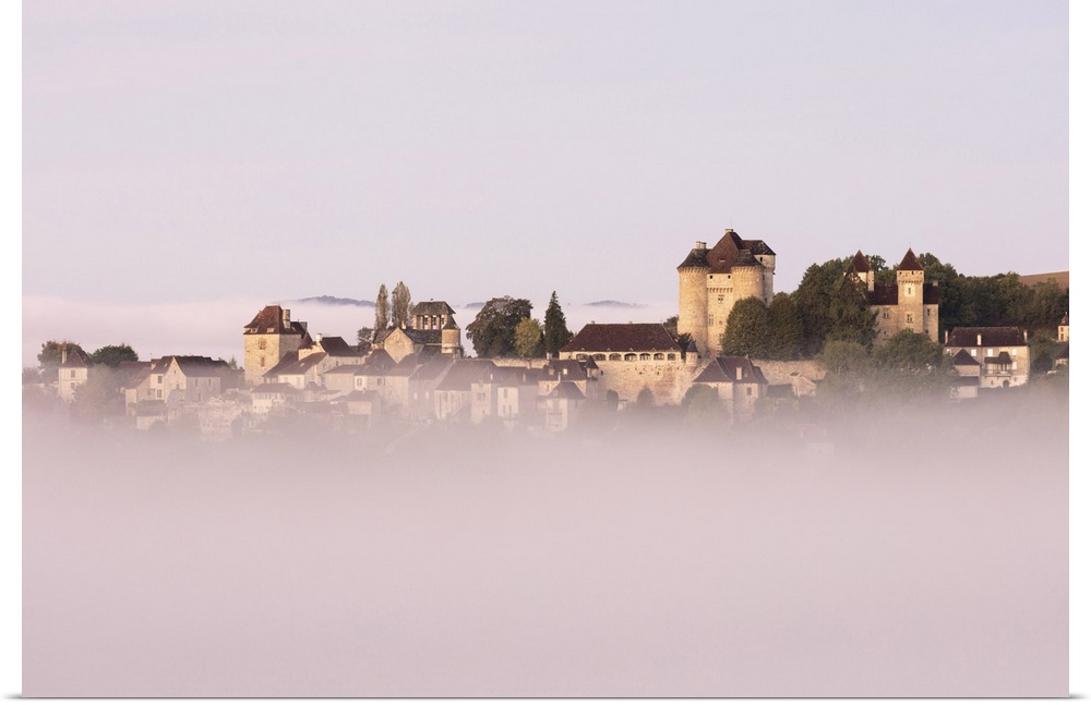 Curemonte labelled l'un des plus beaux villages de France (most beautiful villages in France) in the morning mist, Correze...