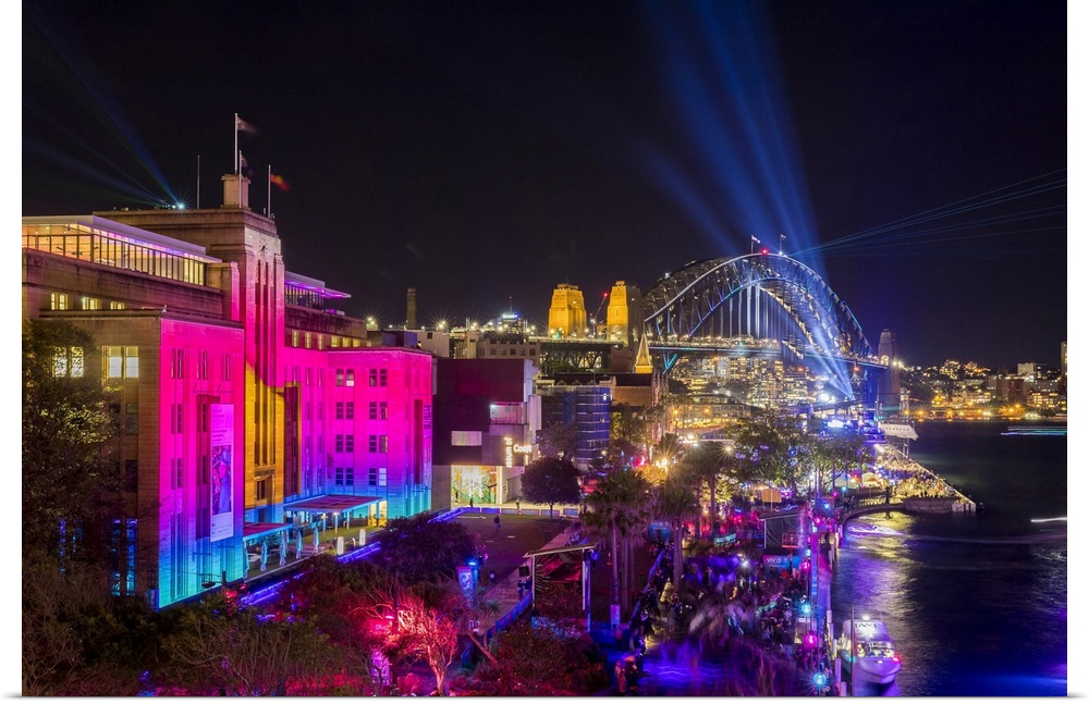 Museum of Contempory Art and Sydney Harbour Bridge illuminated with projections and lasers during Sydney Solstice celebrat...