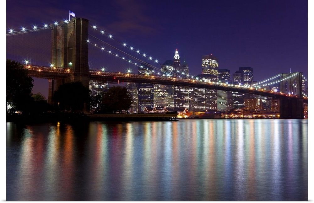USA, New York City, Manhattan,  Brooklyn Bridge and the Downtown Manhattan Financial District skyline at dusk