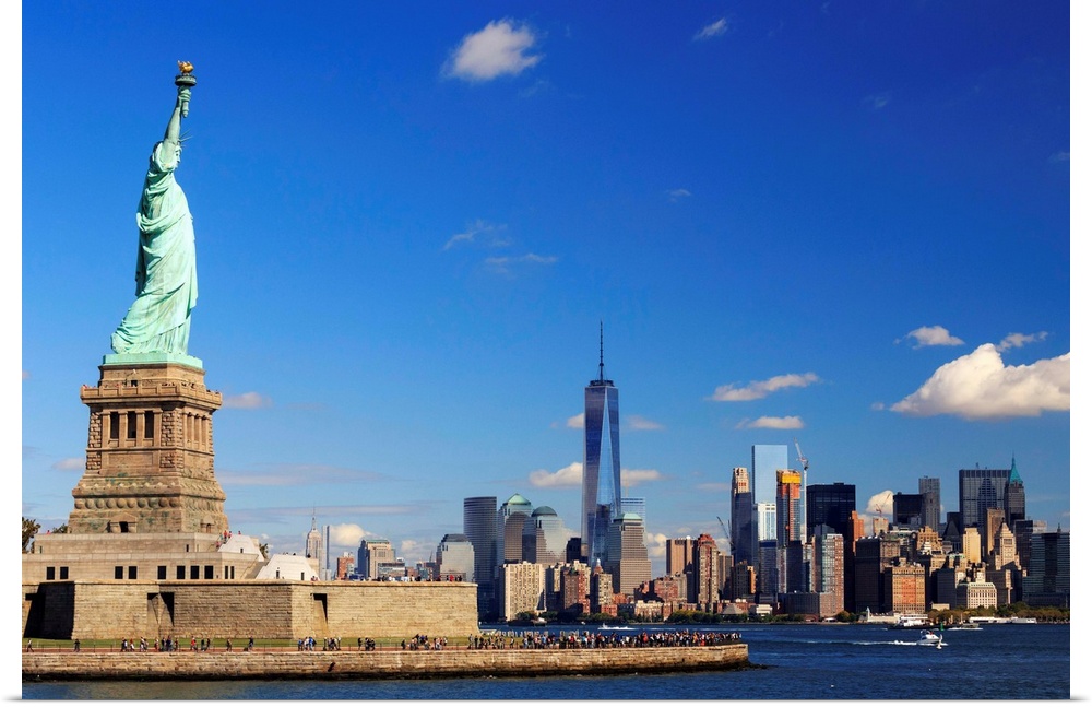 USA, New York, New York City, Statue of Liberty and Lower Manhattan Skyline.