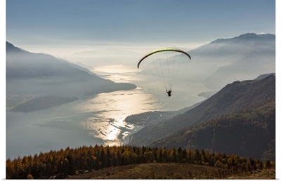 Paragliding over Lake Como and the surroundings mountains, Lombardy, Italy