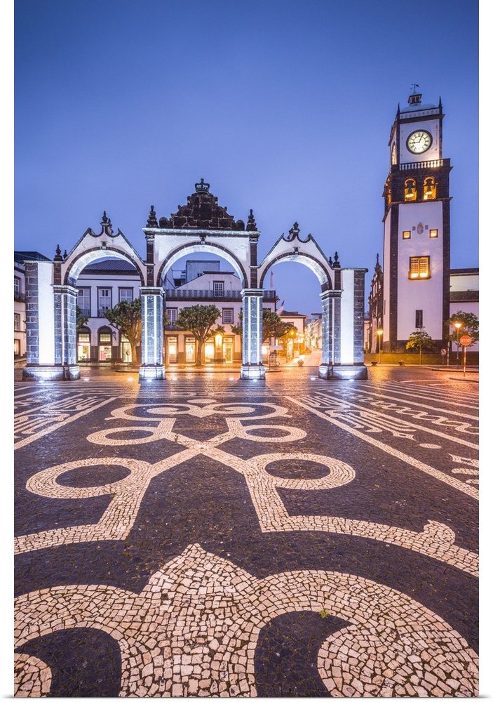 Portugal, Azores, Sao Miguel Island, Ponta Delgada, Portas da Cidade gate and the Igreja Matriz de Sao Sebastiao church