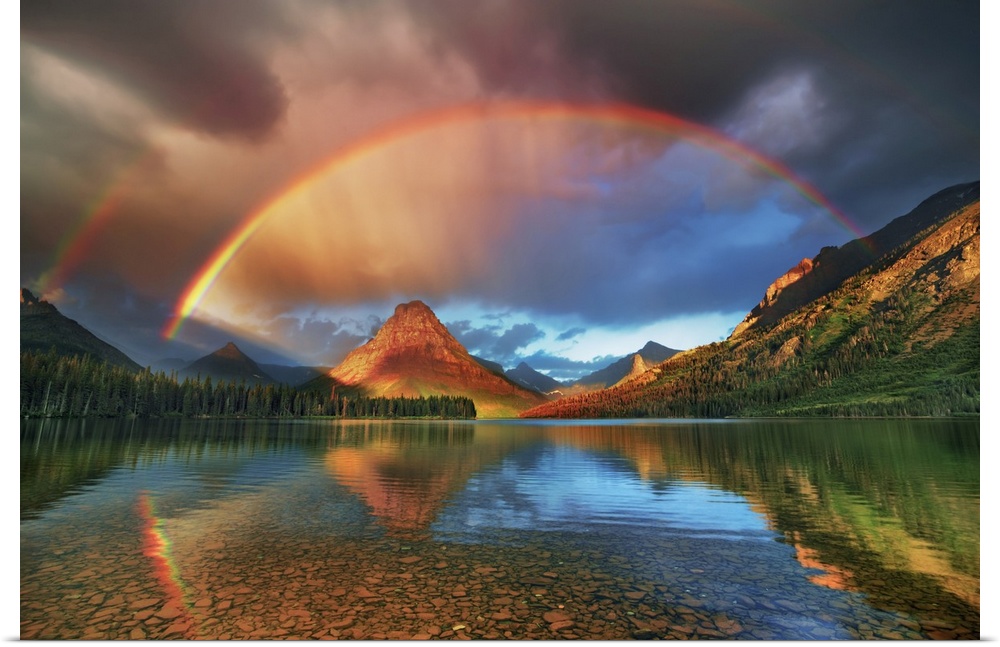 Rainbow at Two Medicine Lake with Sinopah Mountain. USA, Montana, Glacier National Park, Two Medicine Lake. Rocky Mountain...