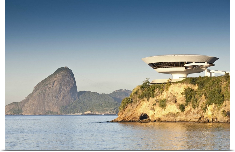 South America, Rio de Janeiro, Niteroi, Oscar Niemeyer's Contemporary Art Museum (MAC Niteroi) in the late afternoon light...