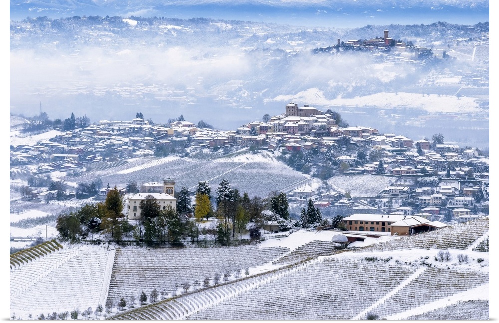 Snow on the three hills of Ceretto Wine, Roddi and Santa Vittoria d'Alba from Diano d'Alba, Piedmont, Italy