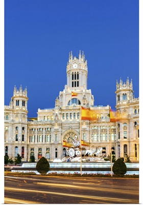Spain, Madrid. Plaza de Cibeles with famous fountain and town hall building behind