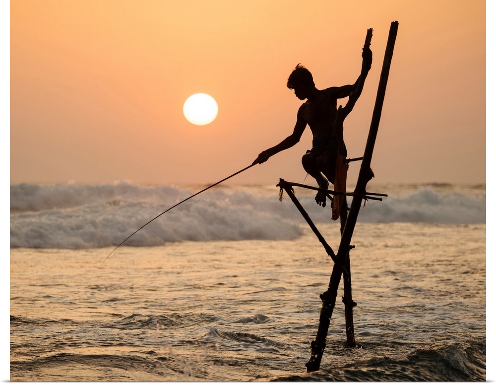 Stilt Fishermen At Dusk, Weligama, South Coast, Sri Lanka, Asia.