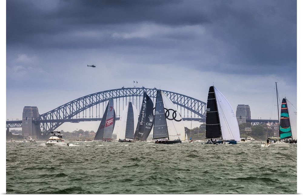 Super maxi yachts competing in the SOLAS Big Boat Challenge on Sydney Harbour, Sydney, New South Wales, Australia.