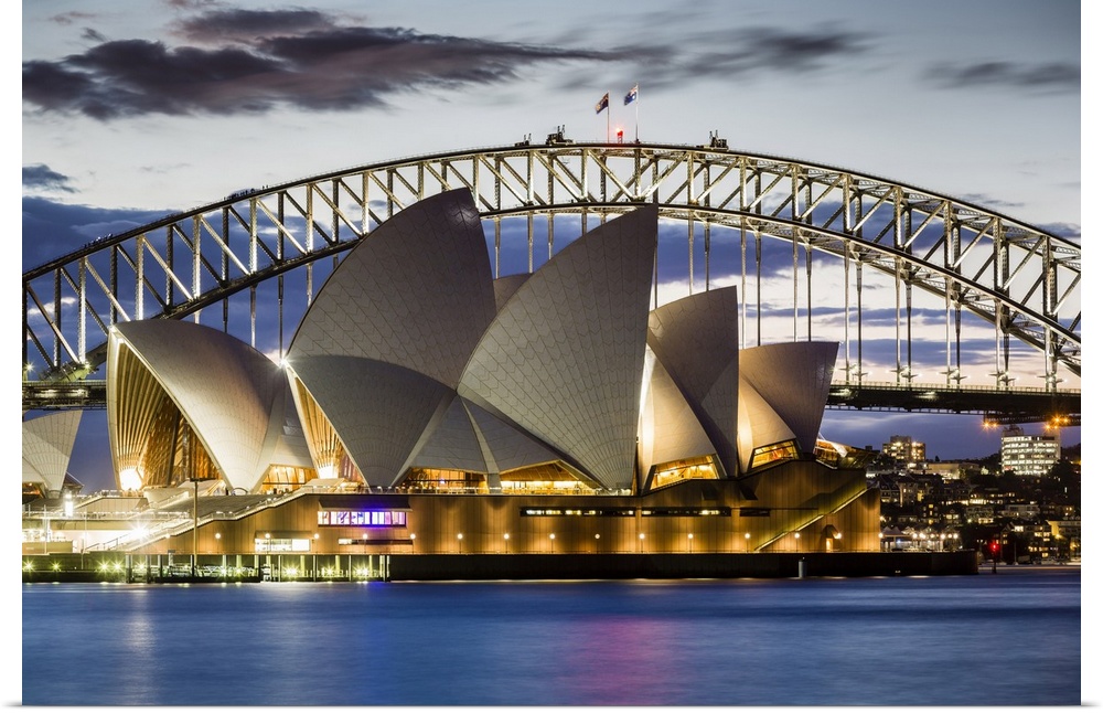 Sydney Opera House and Sydney Harbour Bridge at dusk, Sydney, New South Wales, Australia.