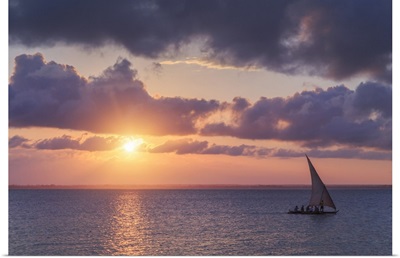 Tanzania. Zanzibar, Michamvi Village, traditional Dhows sailing at sunset