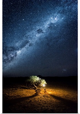 Tourist Camping Outdoor Admiring The Stars Of The Southern Hemisphere, Namibia, Africa.
