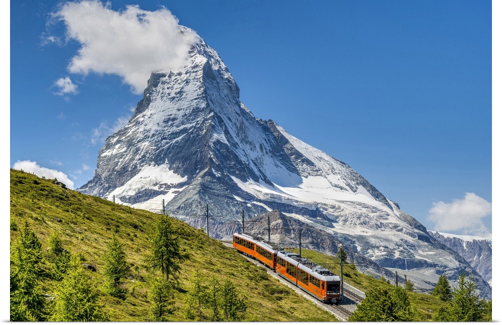 Train along the Gornergrat mountain rack railway with Matterhorn in the foreground, Zermatt, Valais, Switzerland