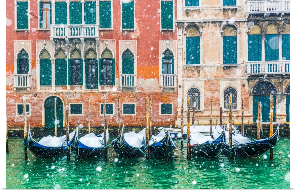 Venice, Veneto, Italy. Snowfall Over Moored Gondolas Along The Grand Canal (Canal Grande).