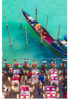 Venice, Veneto, Italy. Tourists Eating Out On The Riverside Of The Grand Canal.