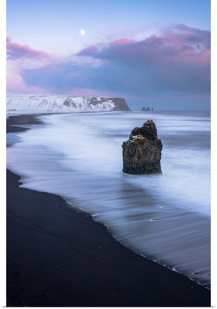 Vik, Southern Iceland, Europe. The black beach of Reynisfjara on a winter sunset.