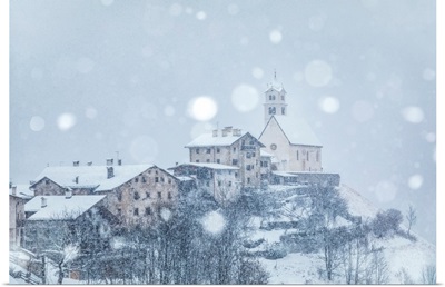 Village Of Colle Santa Lucia, Church On The Hill Under A Snowfall, Agordino, Italy