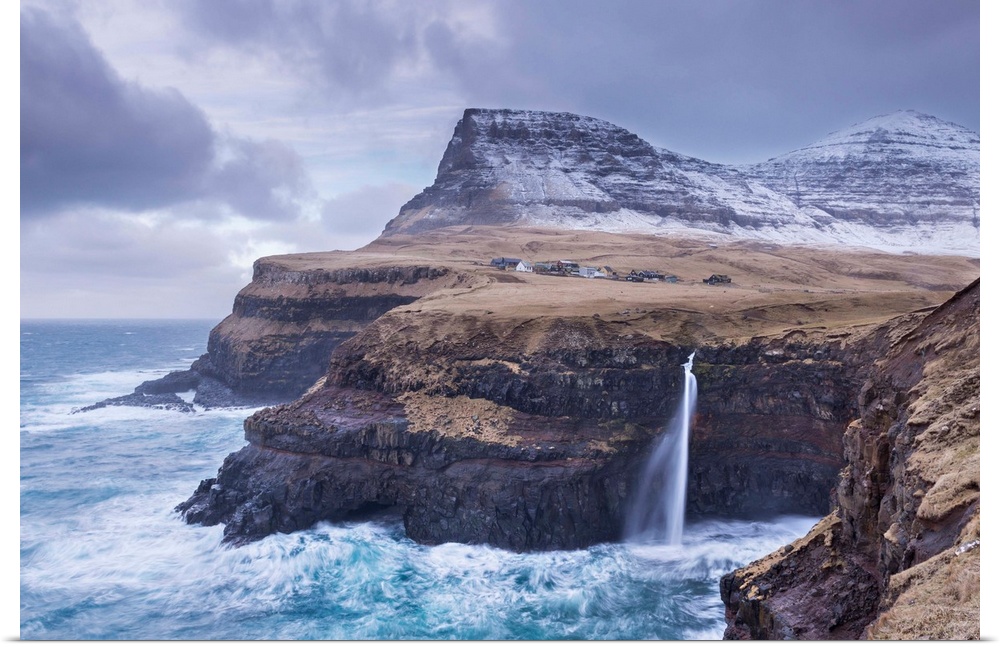Wintry conditions at Gasadalur on the island of Vagar, Faroe Islands, Denmark, Europe. Winter (March) 2015.