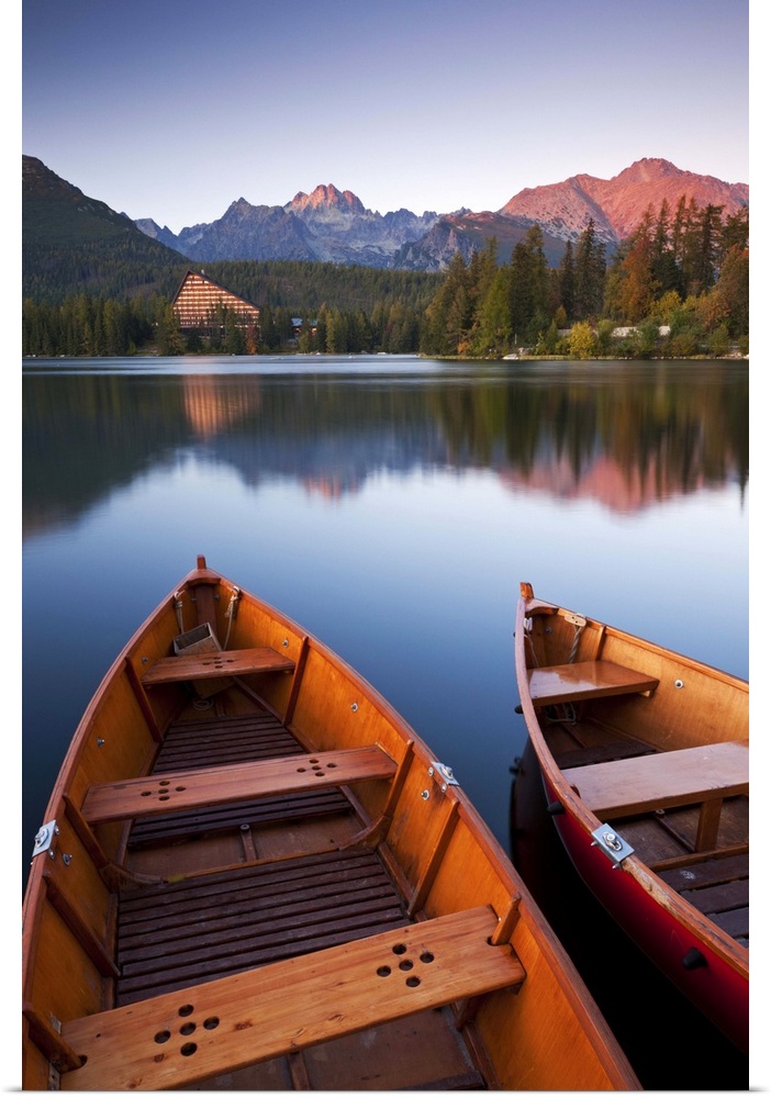 Wooden boats on Strbske Pleso lake in the Tatra Mountains of Slovakia, Europe. Autumn