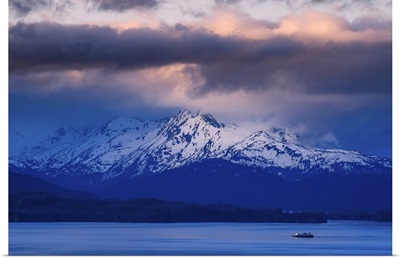 A Lone Fishing Boat Pulls Into Homer Bay at Sunrise; Homer, Alaska