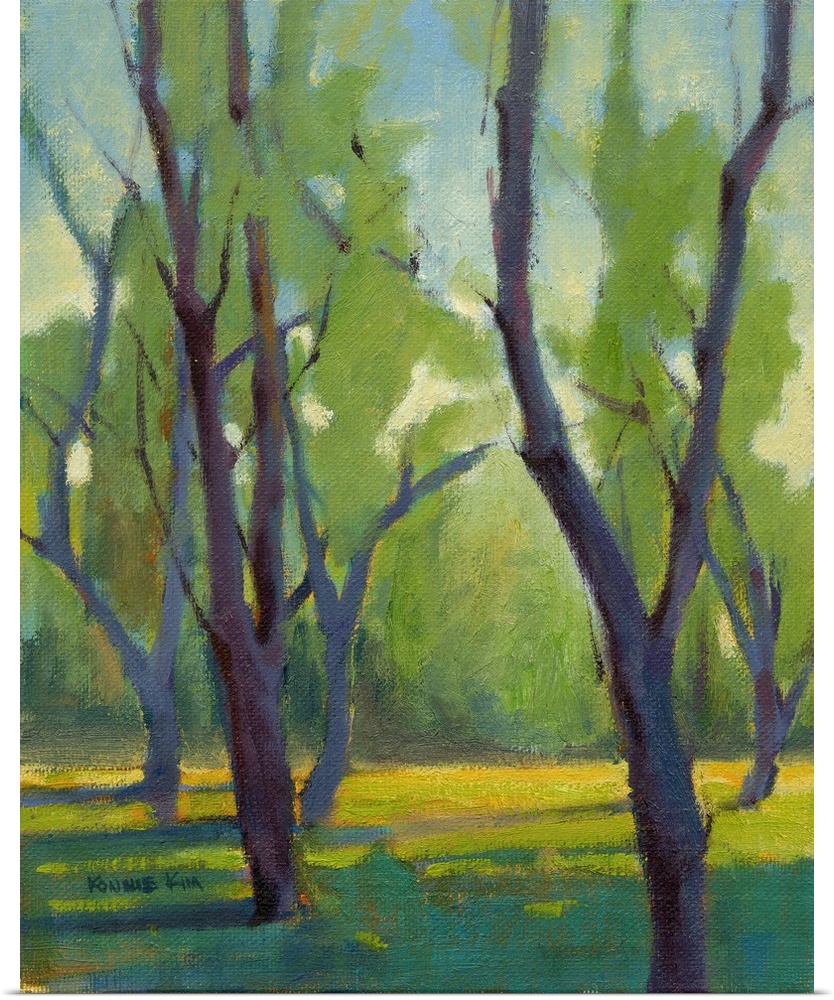 Vertical painting of bare trees.