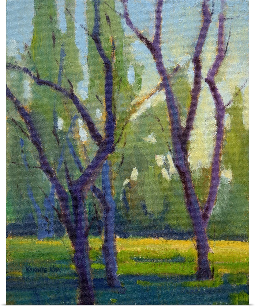 Vertical painting of bare trees.