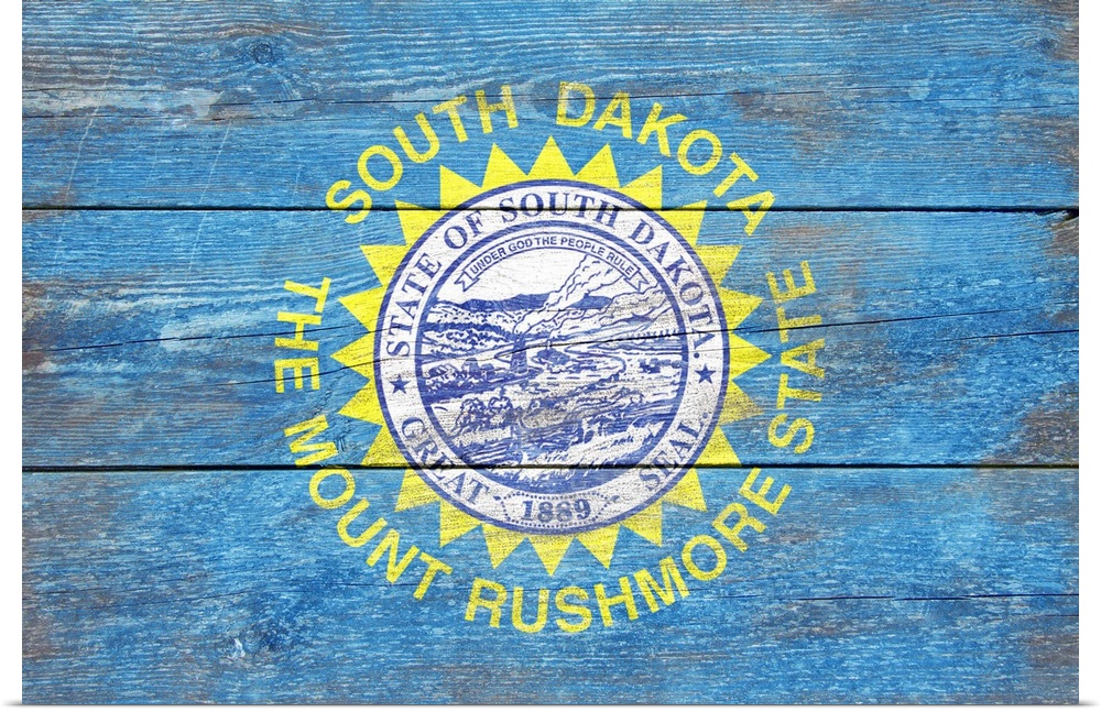 The flag of South Dakota with a weathered wooden board effect.