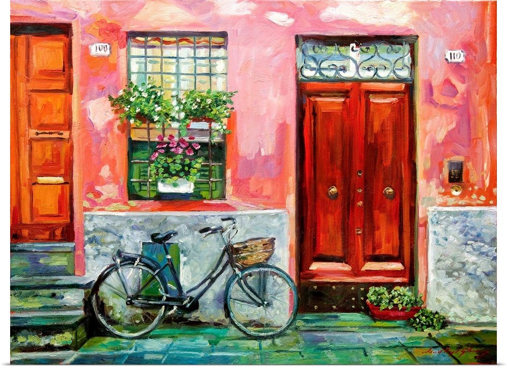 A bicycle leaning against a red wall with a red door.