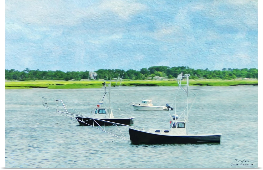 Three fishing boats on the water near the coast in New England.