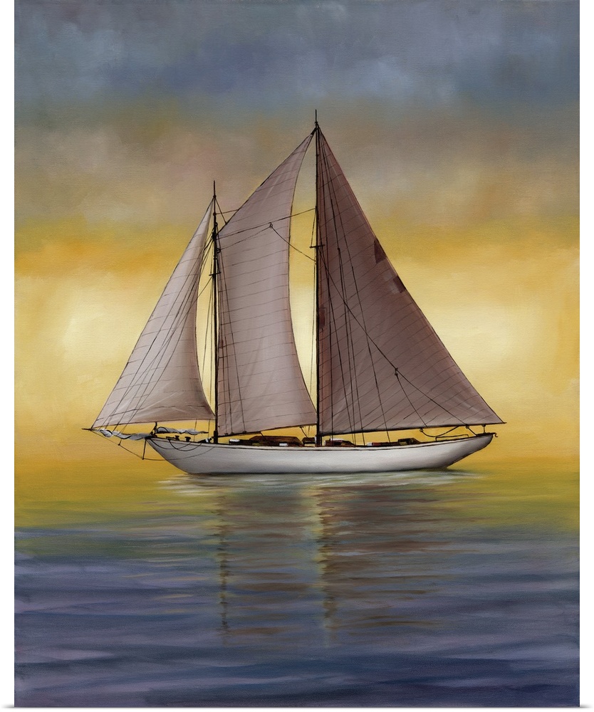 A large sailboat on calm waters at sunset.