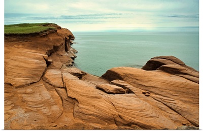 Canada, Quebec: Red Cliffs And Ocean