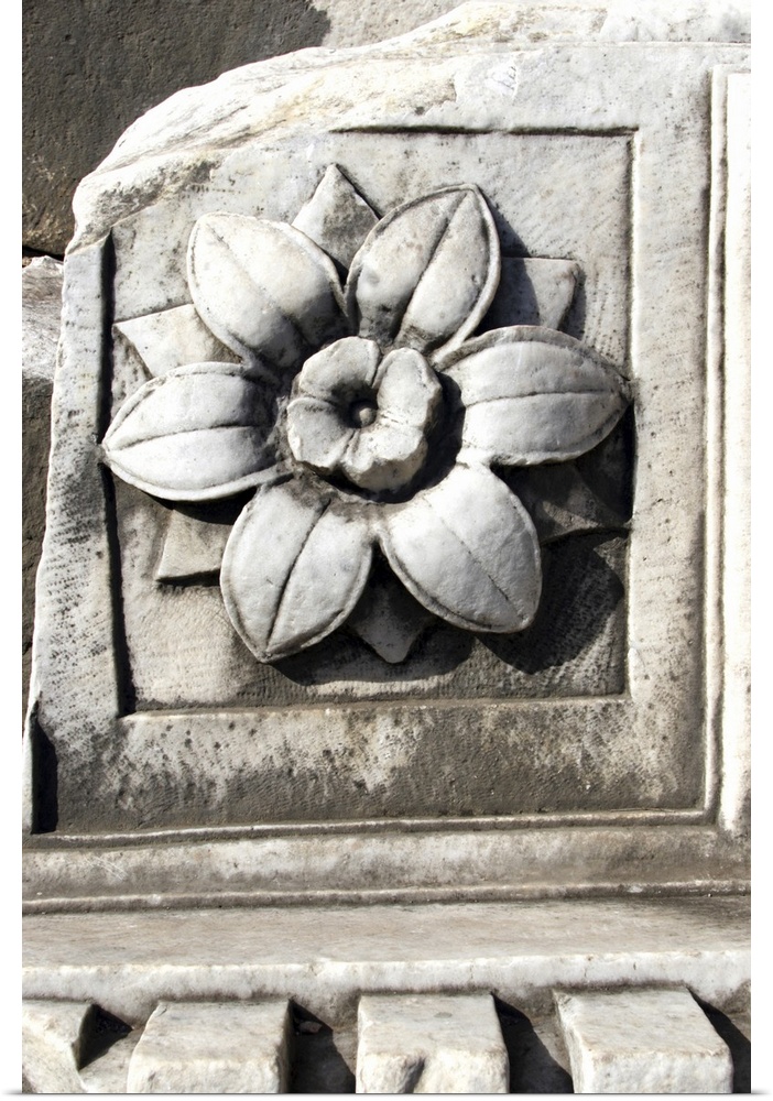 Marble, travertine, decoration representing a flower. Follen to the ground from arch or temple ceiling.
