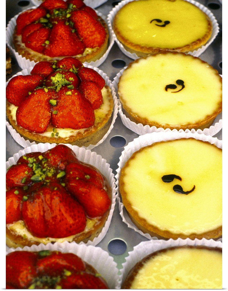 France, Paris: pastry shop window with strawberry and lemon pastries