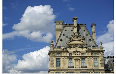 The Louvre Museum in Paris, France, on a cloudy day