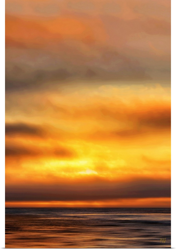 A spectacular ocean sunset in Carmel, California. The artist, Michael Lynberg, adds a touch of impressionism to his photog...