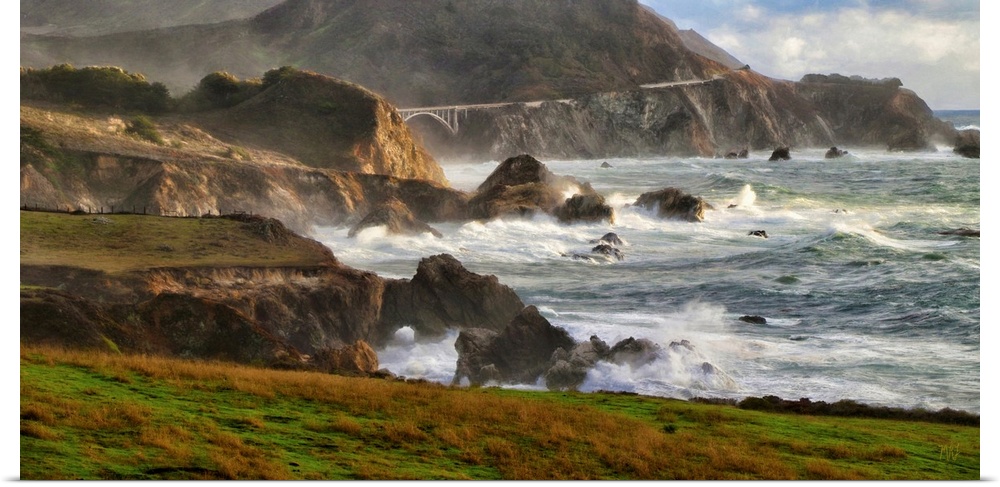 A breathtaking panorama of the Big Sur coastline between Rocky Point and the distant Rocky Creek Bridge. Winter waves surg...