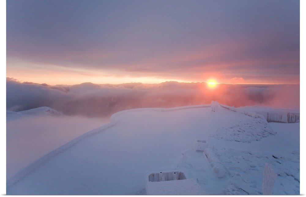 A colorful sunrise on the summit of Mt. Washington.