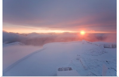 A colorful sunrise on the summit of Mt. Washington