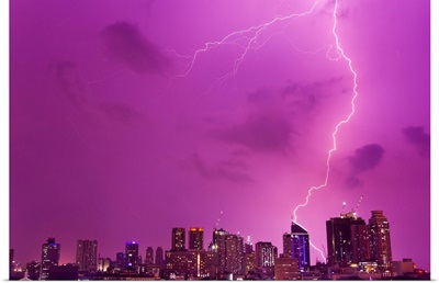 A intense thunderstorm with lightning over the skyline of Manila