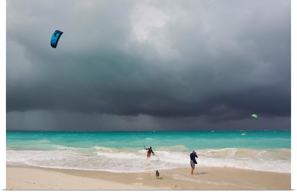 A kiteboarder enjoying gusty winds created by Hurricane Tomas.