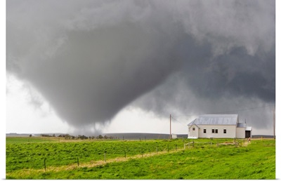 A powerful tornado approaches a church and just misses hitting it